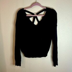 10- Black sweater